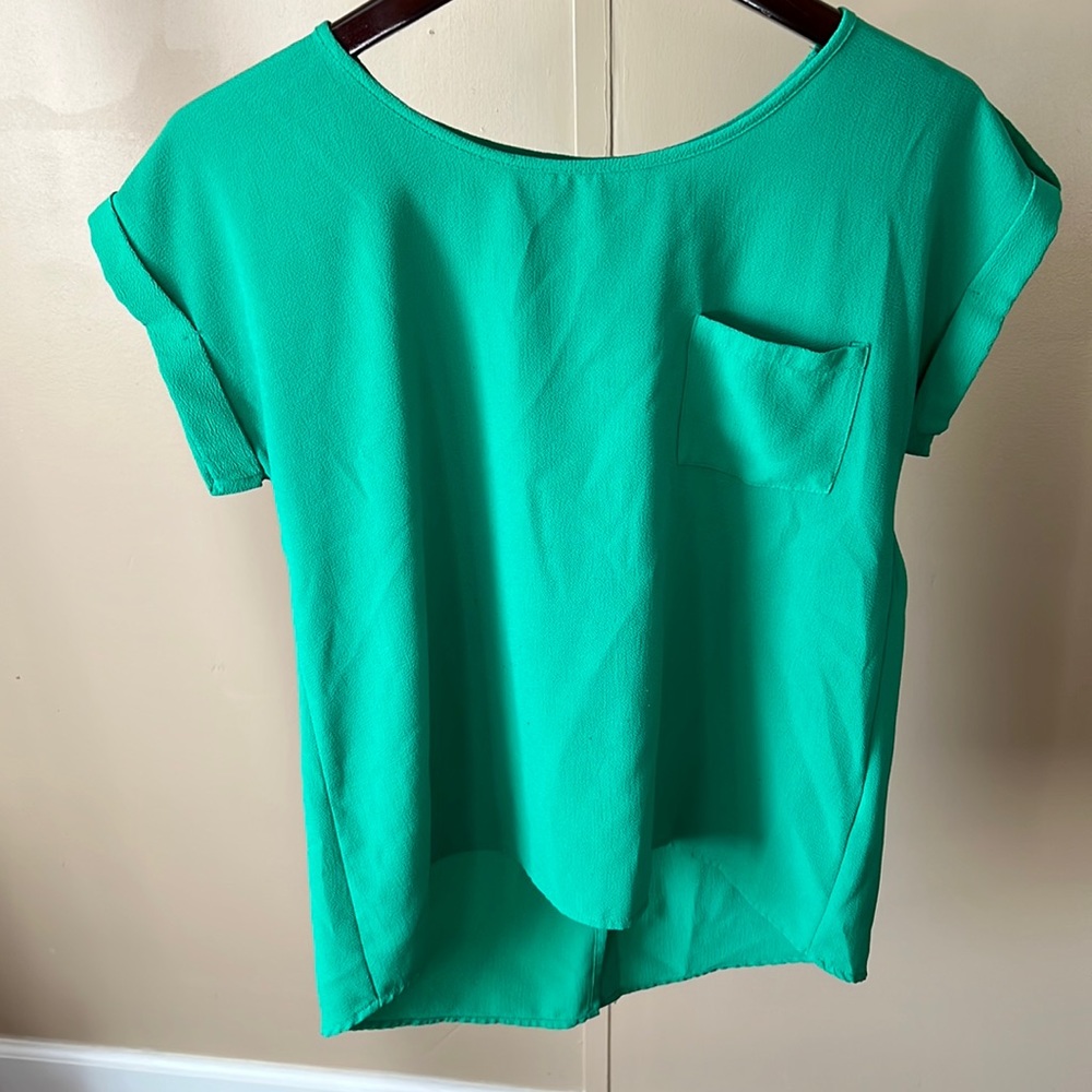Bright green blouse with button up back